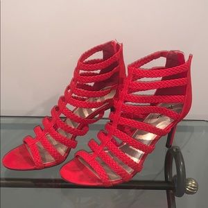 Strappy red heels